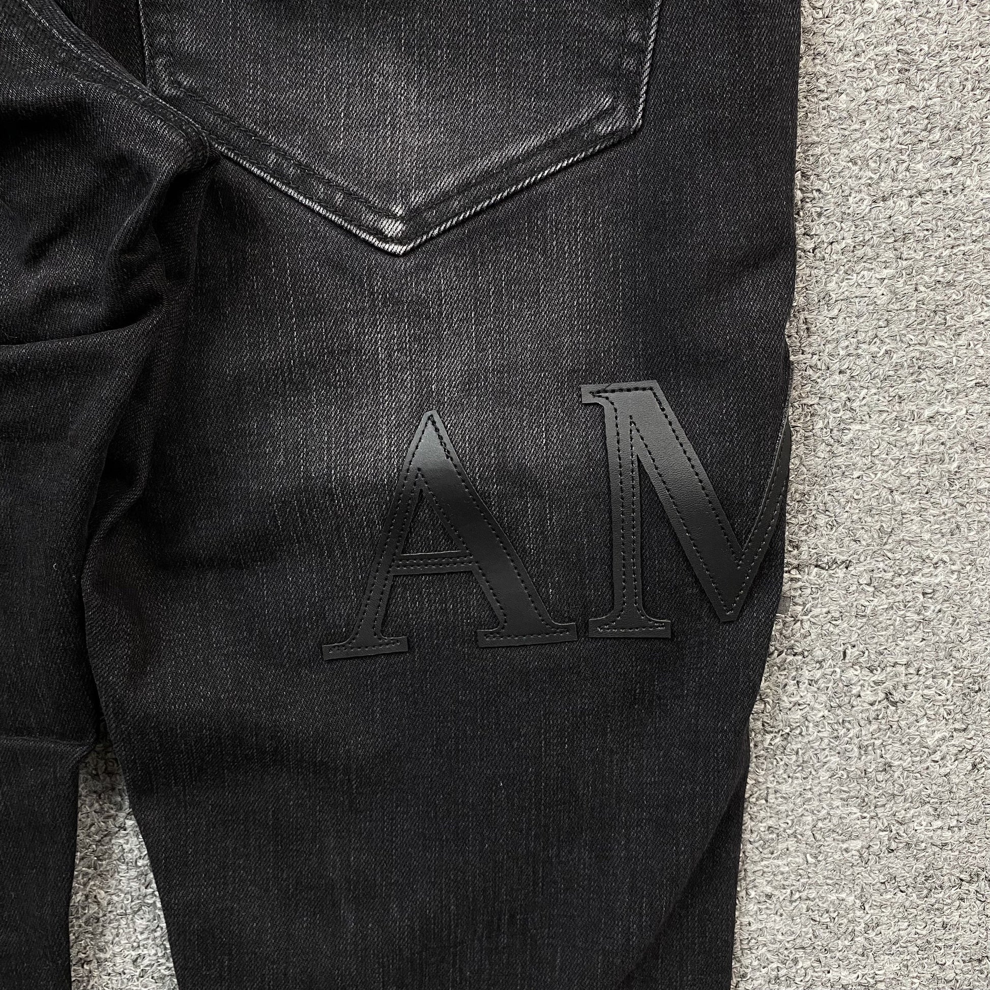 AMIRI CORE APPLIQUE BLACK LEATHER JEANS